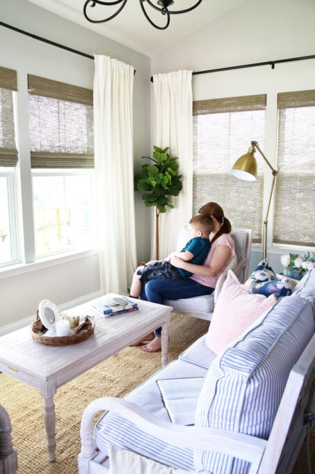 Mom and son sitting in a sunroom