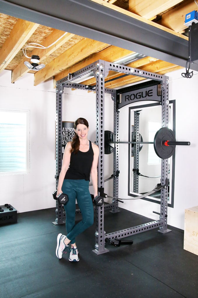 woman with home gym equipment