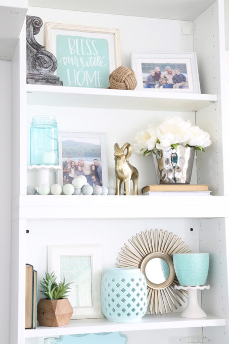 Decorated Shelves with Aqua, White, and Neutral Coastal Decor