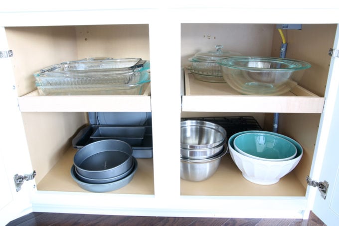 Organized Kitchen with Baking Pans, Mixing Bowls, and Cooling Racks