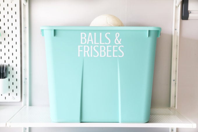 Storage Bin with Vinyl Label in an Organized Garage