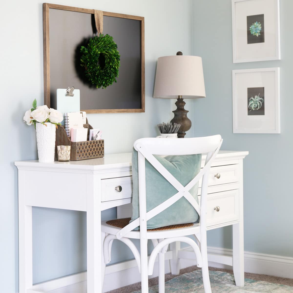 Beautiful white writing desk in an organized home office