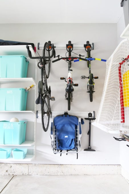 Bikes Stored on Gladiator Track System in Organized Garage