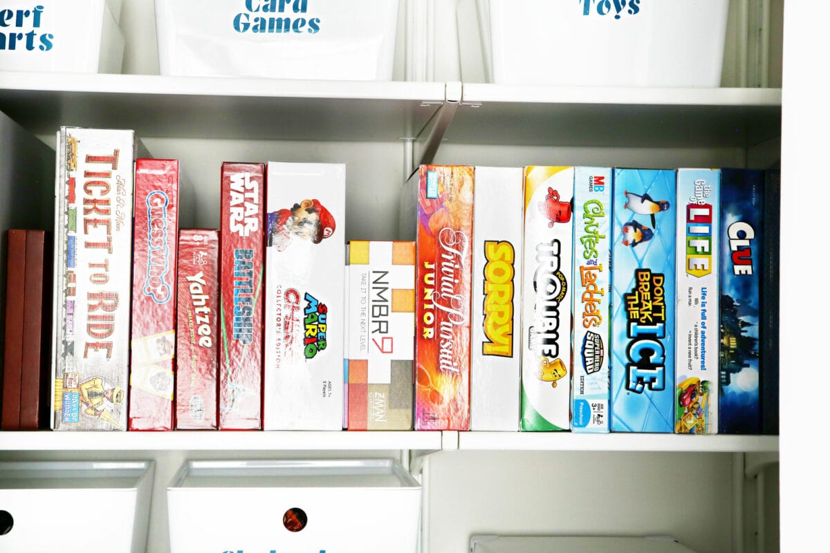 Board Games Stored Vertically in an Organized Game Closet