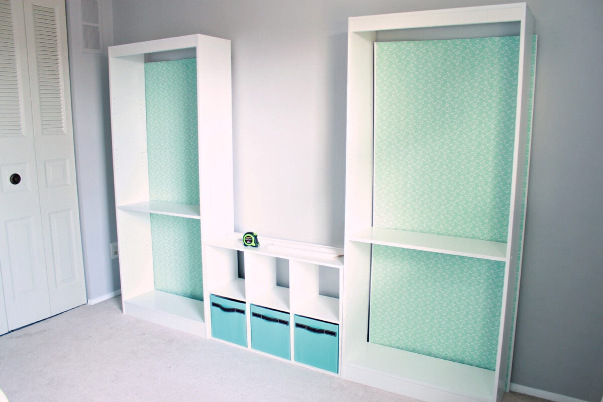 Bookshelves with a Mint Wrapping Paper Background