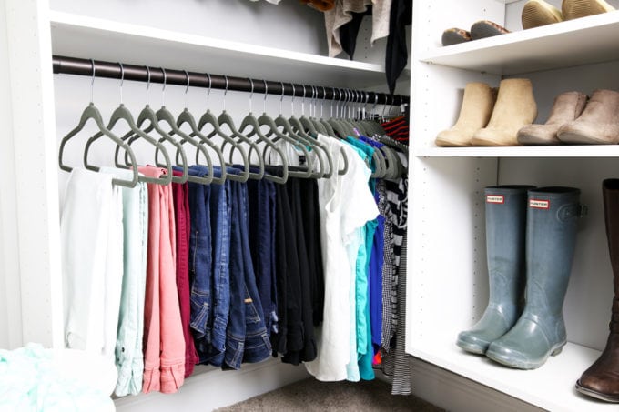 Hanging Clothes with Matching Hangers in an Organized Closet