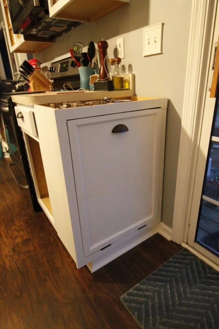 Hide your trash can by turning it into a pullout trash can