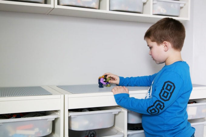 Little Boy Playing on a DIY IKEA LEGO Table with Storage