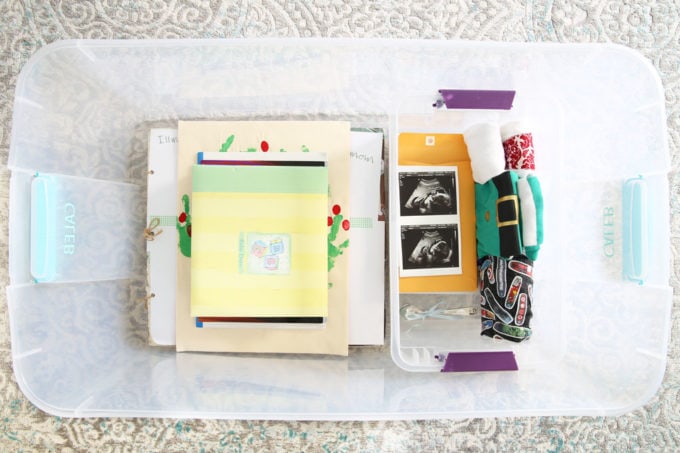 Child's Mementos Stored in an Organized Plastic Bin