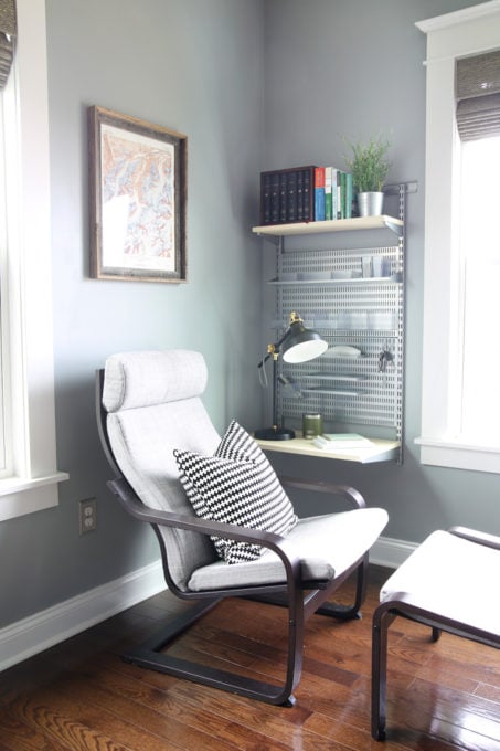 side view of the office chair and wall shelving