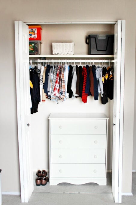 kids' closet with dresser inside