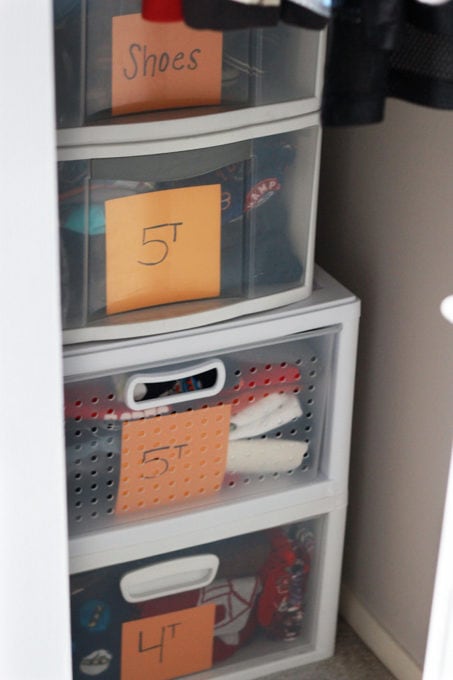 hand-me-downs stored in the back of a closet, closet organization ideas