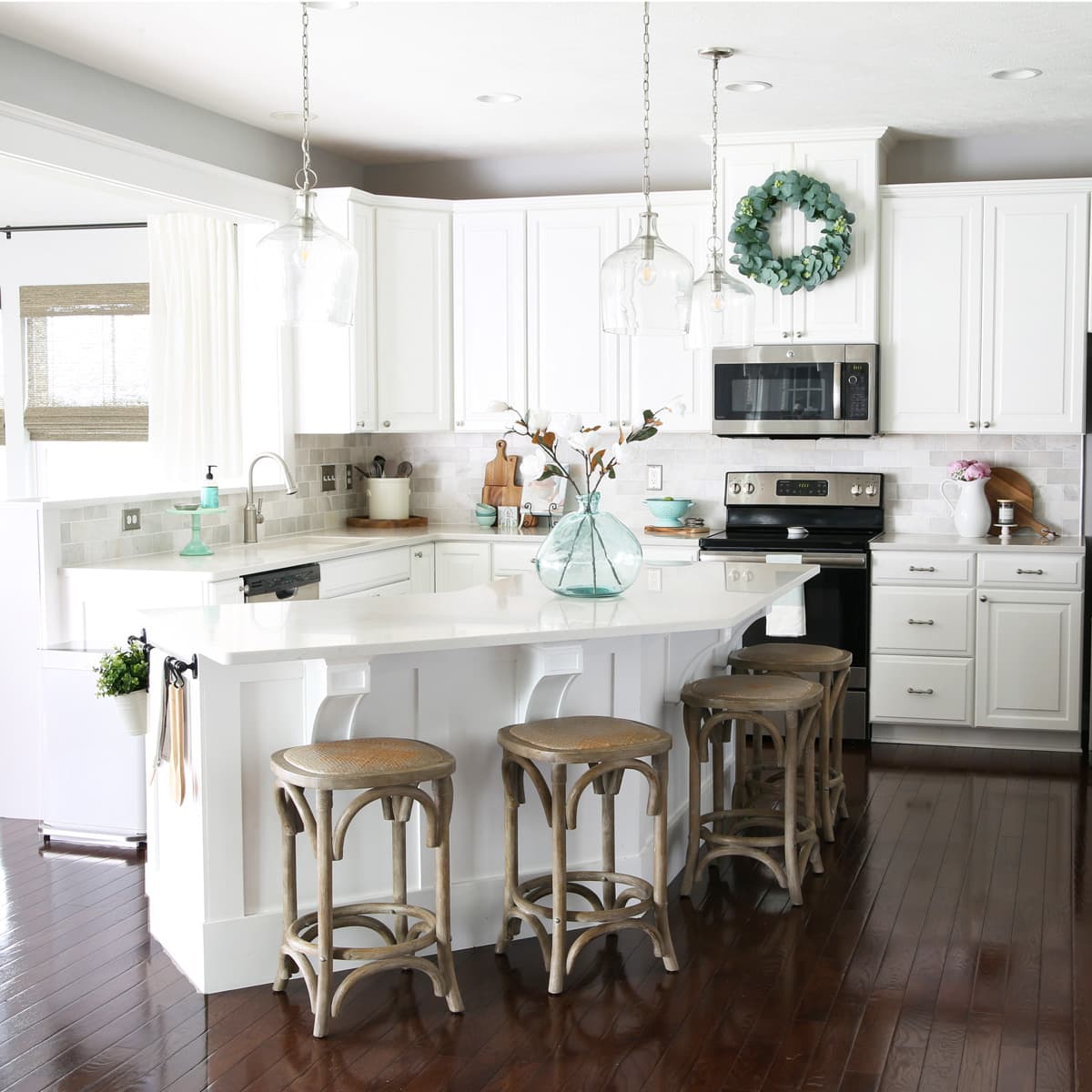 Uncluttered White Kitchen with a Large Island