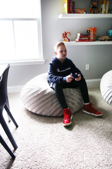 Boy Playing Video Game, Sitting on a Beanbag Chair