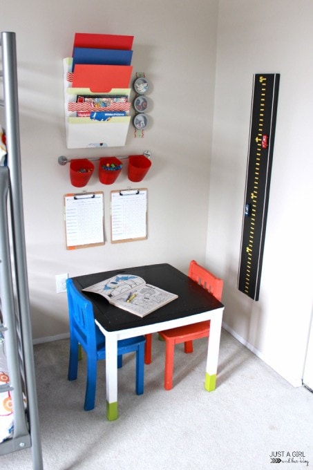 Arts and crafts corner in an organized kids' bedroom