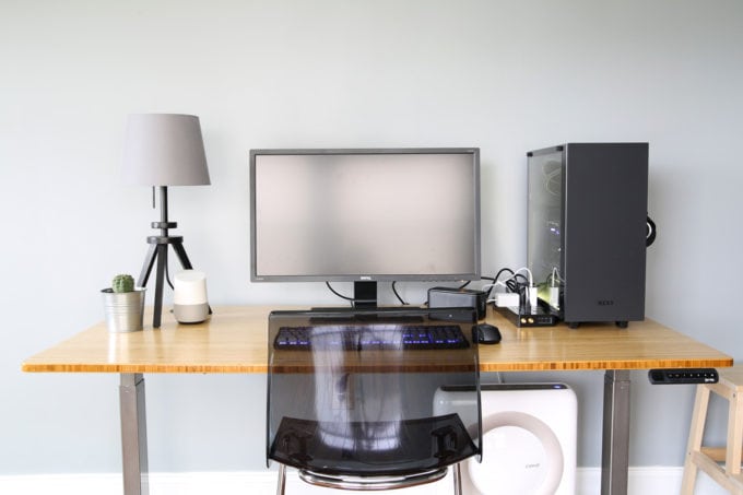 front view of the desk with a computer sitting on it 