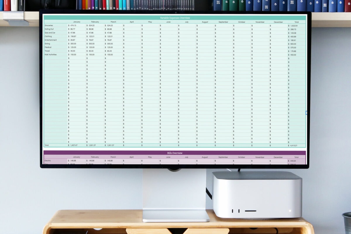 Desktop Computer Showing Budget Spreadsheet with Yearly Spending Overview