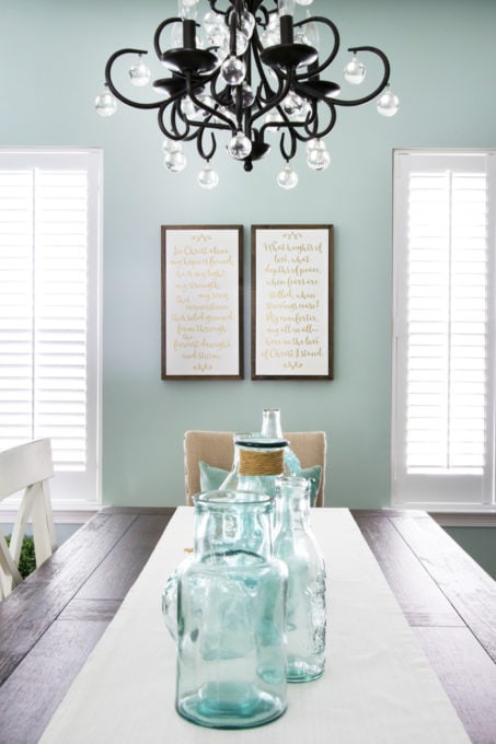 Dining Room Table with Aqua Glass Jars for a Centerpiece