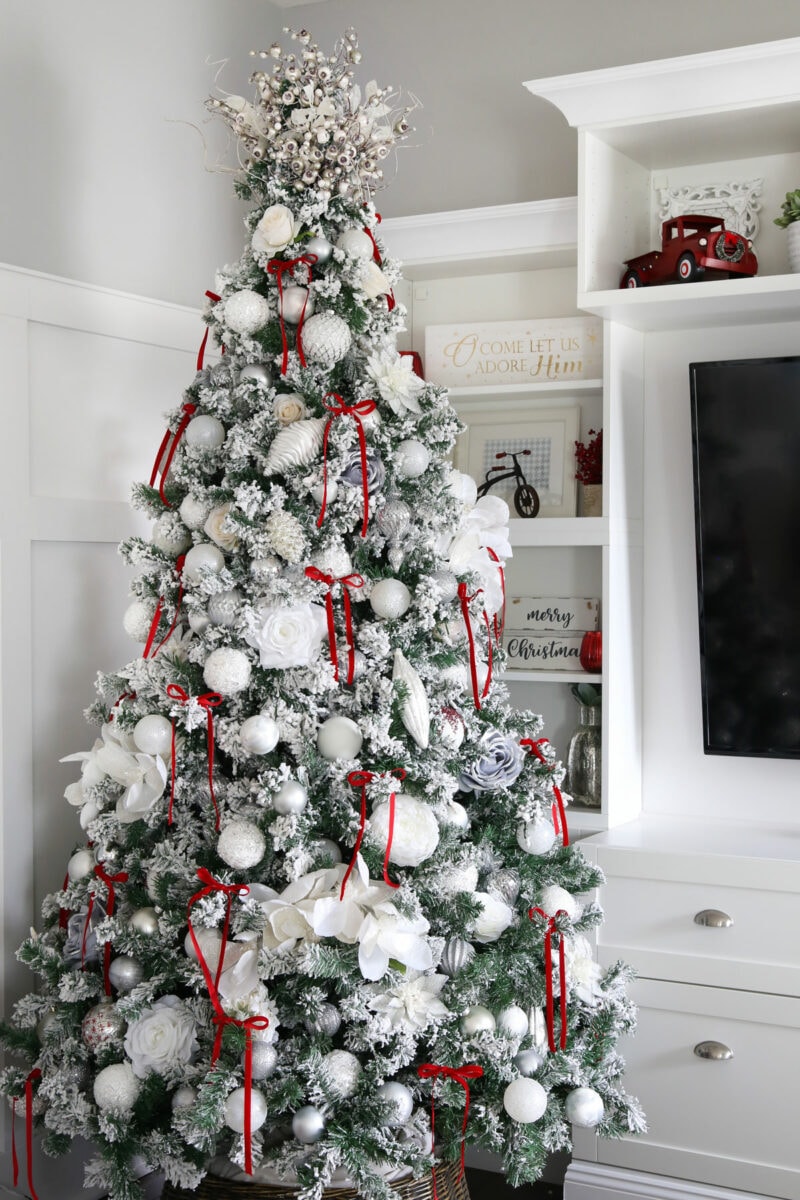 Christmas Tree Decorated in White with Red Accents, Including a Beautiful DIY Tree Topper