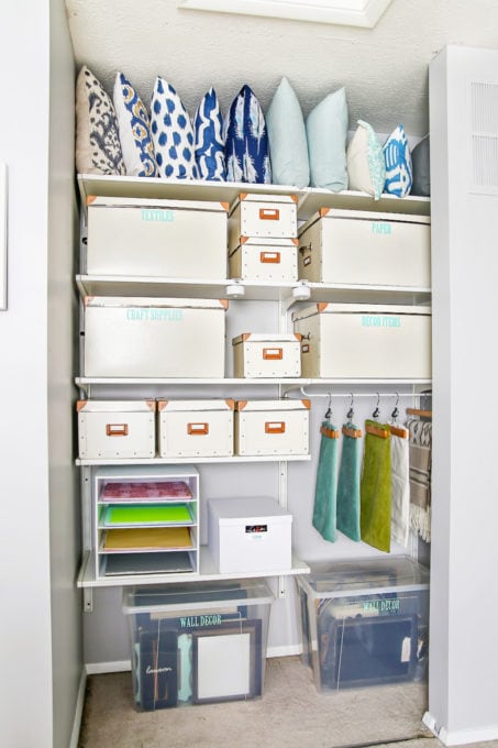 This super helpful post talks about IKEA's 3 best storage systems-- ALGOT, BESTA, and PAX-- and gives great ideas for using them in your home! | IKEA BESTA storage system, modular storage system, IKEA ALGOT closet system, custom closet system, IKEA PAX wardrobe system, DIY wardrobe, IKEA hack, how to plan for and install IKEA storage systems, organized home office closet and craft room closet with IKEA ALGOT closet system