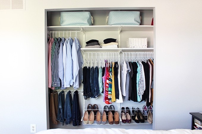 front view of the small closet after organizing and adding the clothes back in