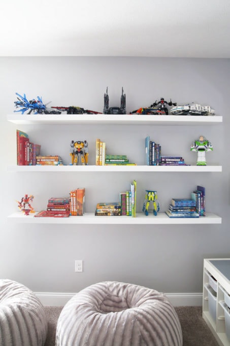 IKEA LACK Floating Shelves Holding Books and LEGO Sets with Beanbags on the Floor