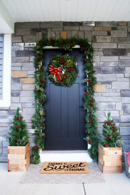 Front Door with Christmas Garland and Holiday Wreath