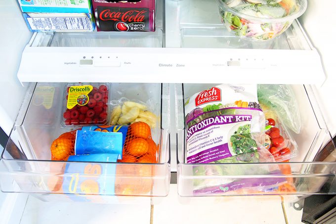 looking down into the organized fruit and veggie drawers