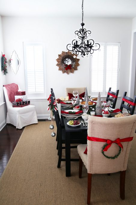 Christmas decorated dining room with new plantation shutters over the windows. 