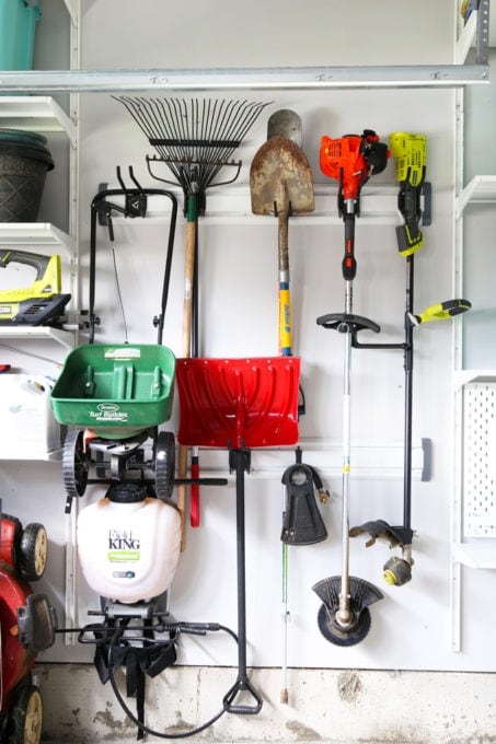 Gladiator Track System Holding Outdoor Tools, Brilliant Garage Storage Ideas for an Organized Garage