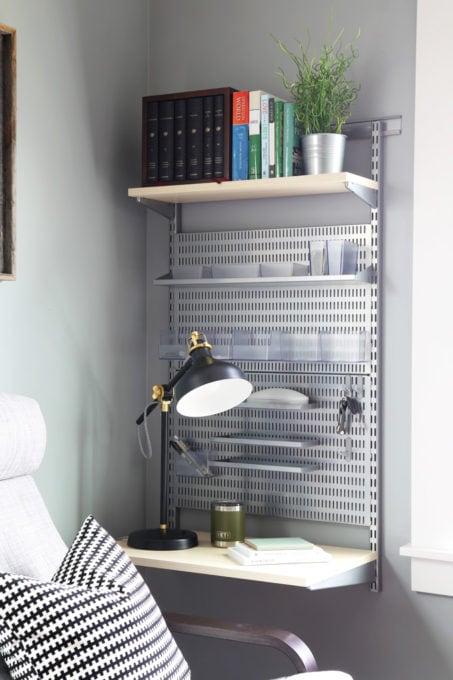 masculine shelving hanging on the water in the corner