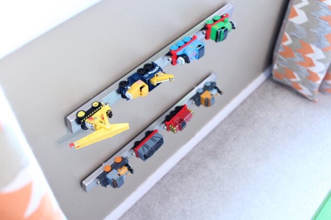 Magnetic knife rack holding toy trains