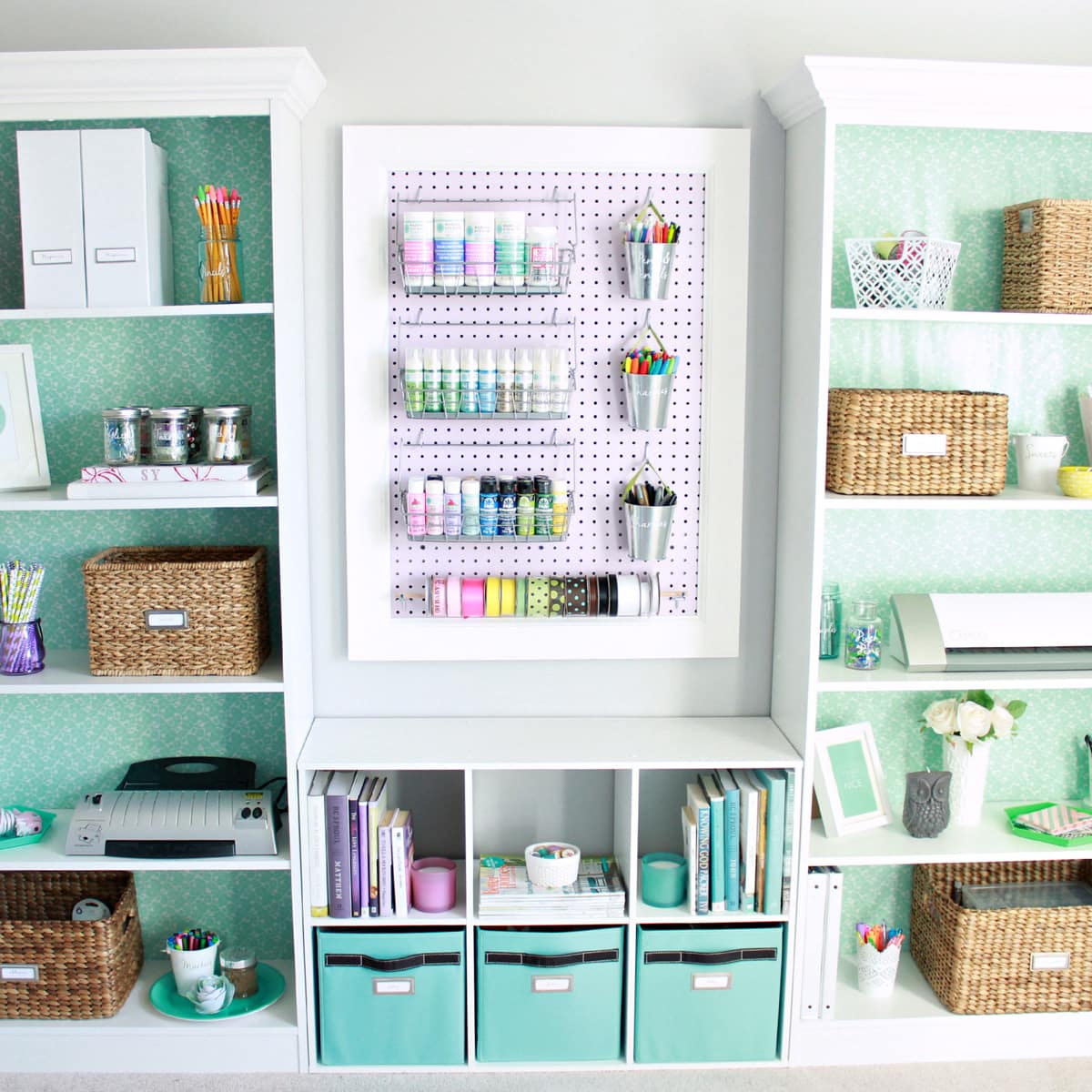 Home Office Organized with Bookshelves and Pegboard