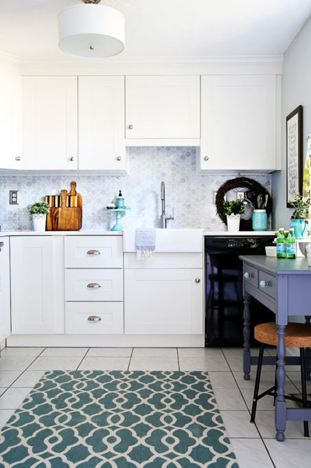 White IKEA SEKTION Kitchen with GRIMSLOV Cabinet and Drawer Fronts and Farmhouse Sink