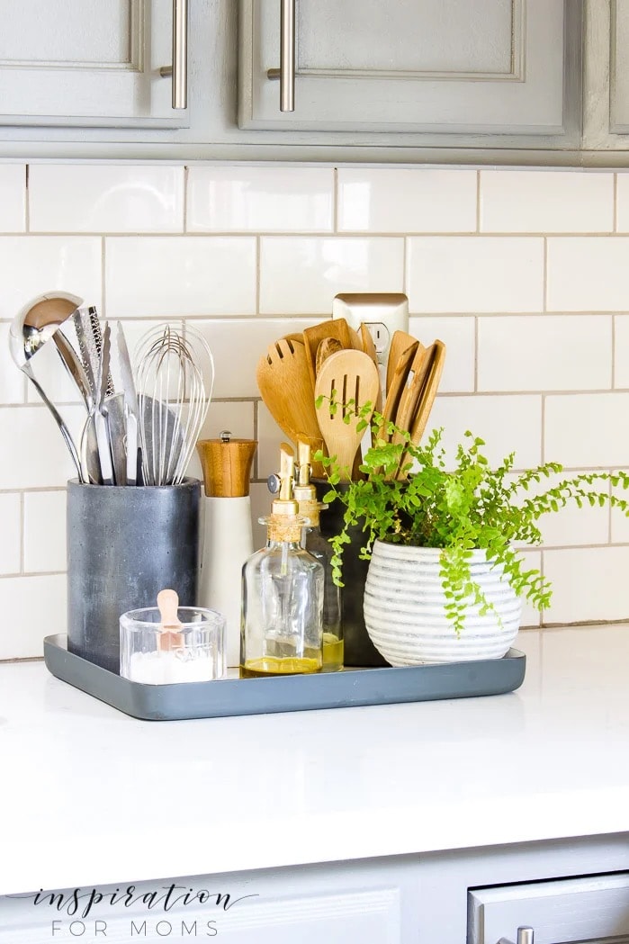 Add a tray to your kitchen counter to house frequently used items and still have it look pretty