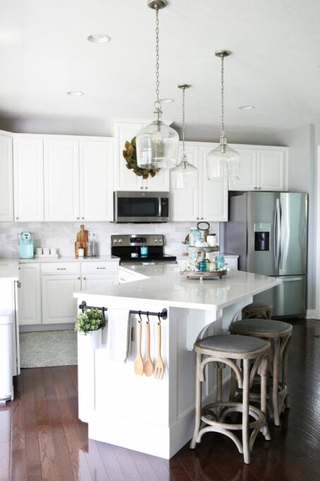 White kitchen with aqua fall decor, buy less decor with a whole house uniform