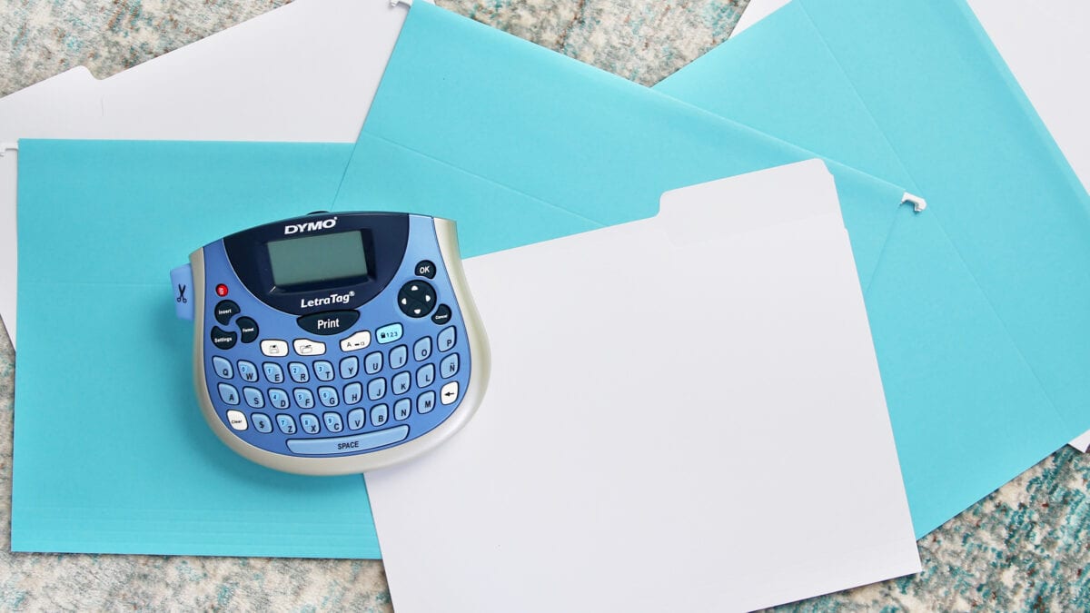 Label maker, file folders, and hanging folders for organizing emergency documents