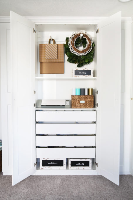 This super helpful post talks about IKEA's 3 best storage systems-- ALGOT, BESTA, and PAX-- and gives great ideas for using them in your home! | IKEA BESTA storage system, modular storage system, IKEA ALGOT closet system, custom closet system, IKEA PAX wardrobe system, DIY wardrobe, IKEA hack, how to plan for and install IKEA storage systems, built in storage unit for home office made with IKEA PAX wardrobe system and custom trim work, GRIMO doors, hanging storage, PAX drawers