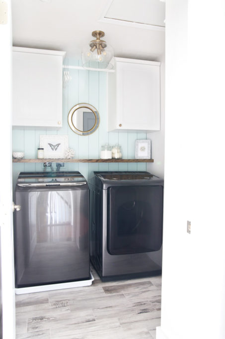 Small Organized Laundry Room with Vertical Shiplap Painted Aqua