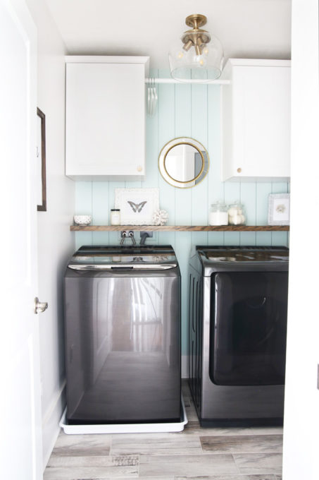 Small Laundry Room with DIY Shelf Above Washer and Dryer