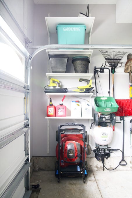 Folding Lawn Mower Storage in an Organized Garage