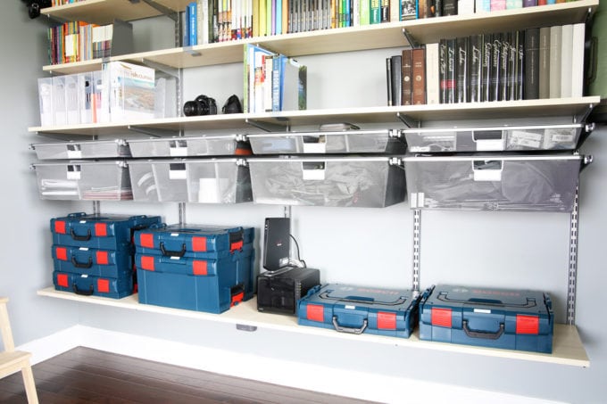 close up of computer and offices supplies on the shelves