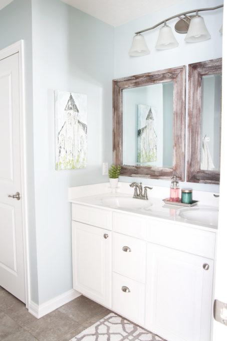 Master Bathroom with White Vanity and Wood Framed Mirrors, Sherwin Williams Rainwashed Paint Color