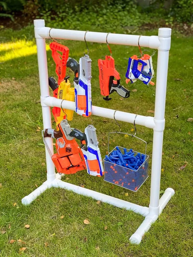 Assembled PVC pipes with hooks and hanging nerf guns