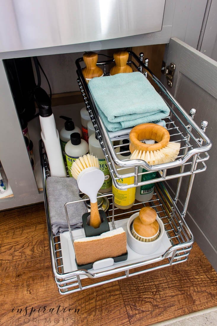 Install a sliding organizer under your kitchen sink to maximize the space