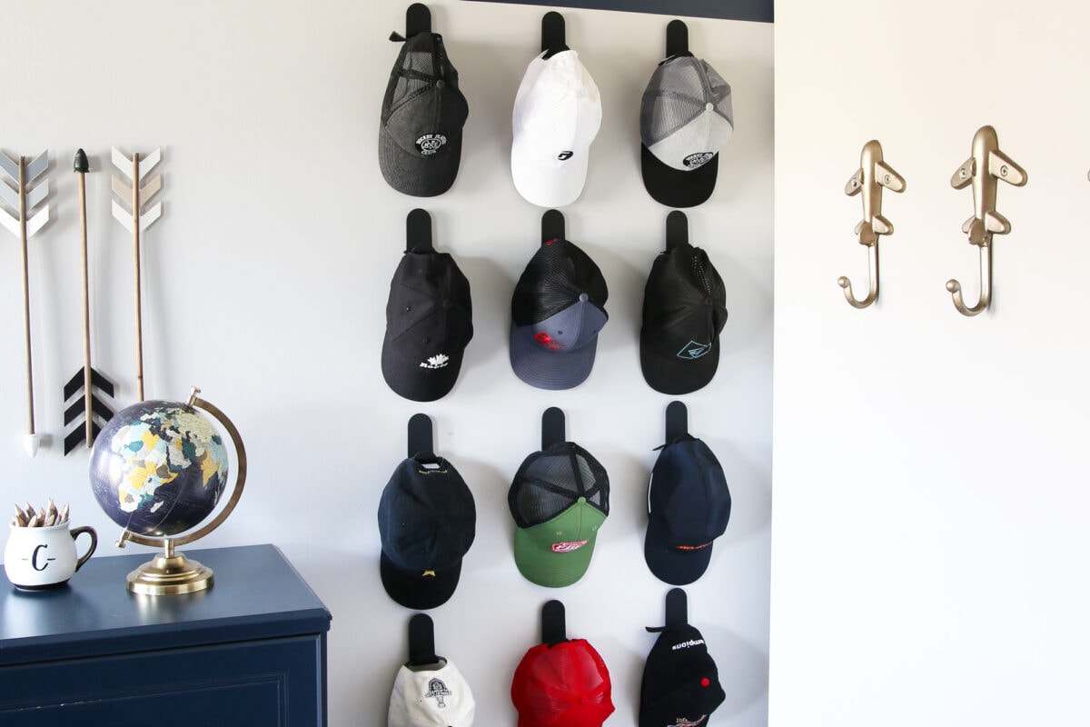 Organized hat wall in boys' bedroom