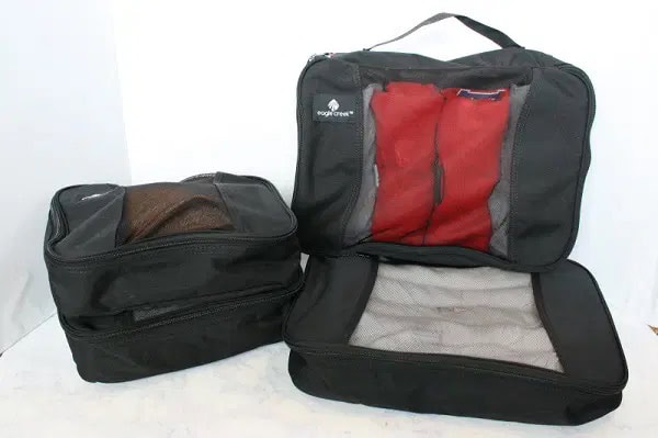 Three black packing cubes for organized travel