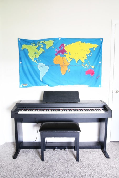 Keyboard and Wall Map in Organized Playroom