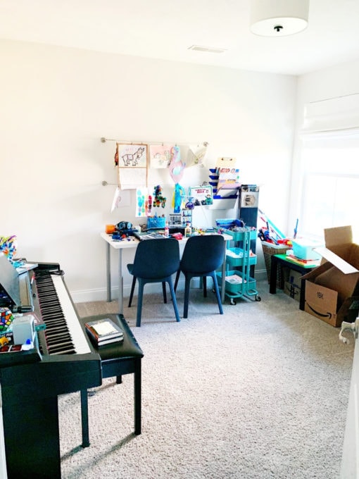 Cluttered Playroom Before Photo