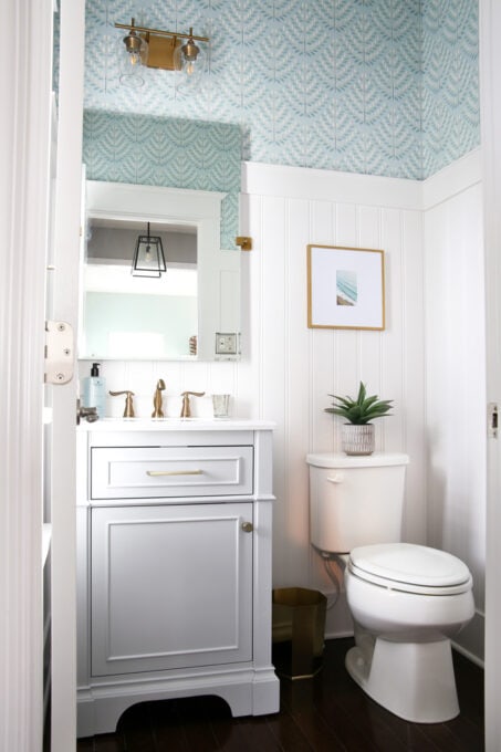 Half Bath with High White Beadboard Wainscoting